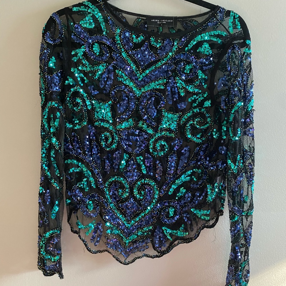 Sequined blue and turquoise mesh top.